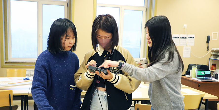 Girls participating in STEM activities