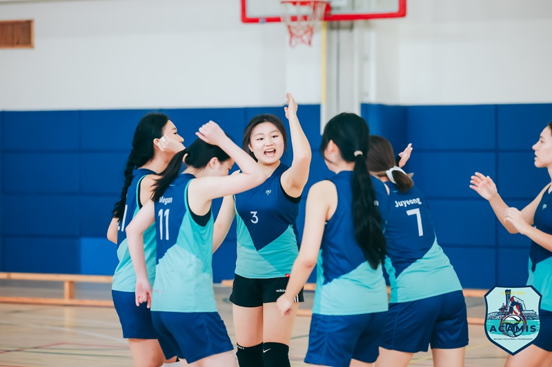 Girls volleyball team during a game
