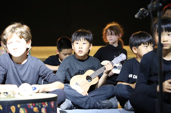 A student with ukulele