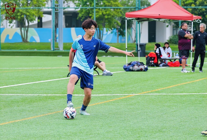Boy playing soccer