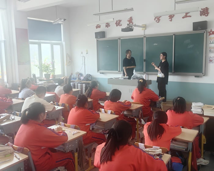 International students teaching in a public school