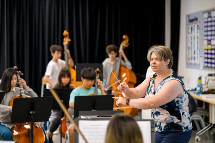 Ms. Ashley Mims teaching a music class
