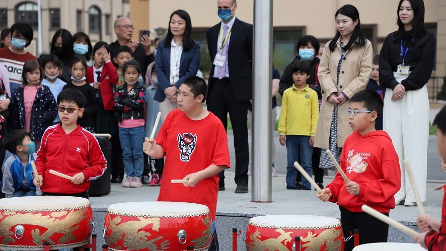 Drummers playing at the art show opening